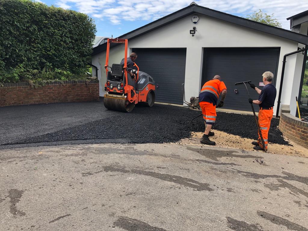 This is a photo of a bitumen driveway which is in the process of being installed by Stirling Road Tech SA