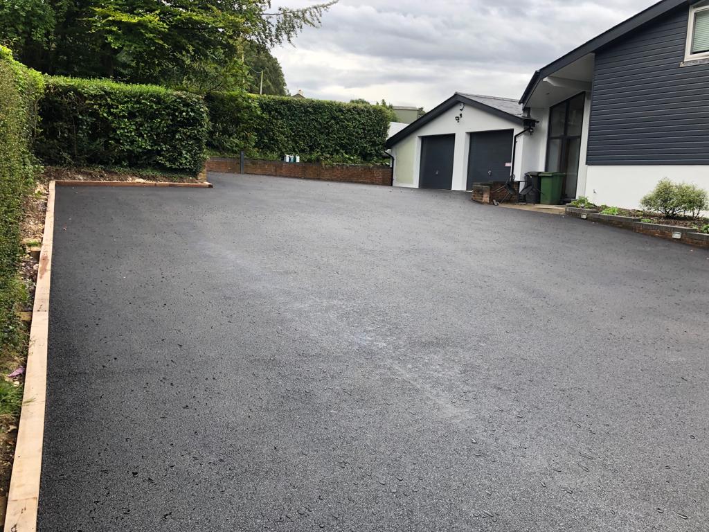This is a photo of a asphalt driveway which is in the process of being installed by Stirling Road Tech SA